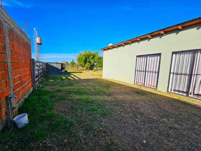 Imagen borrosa del lateral de la casa en venta