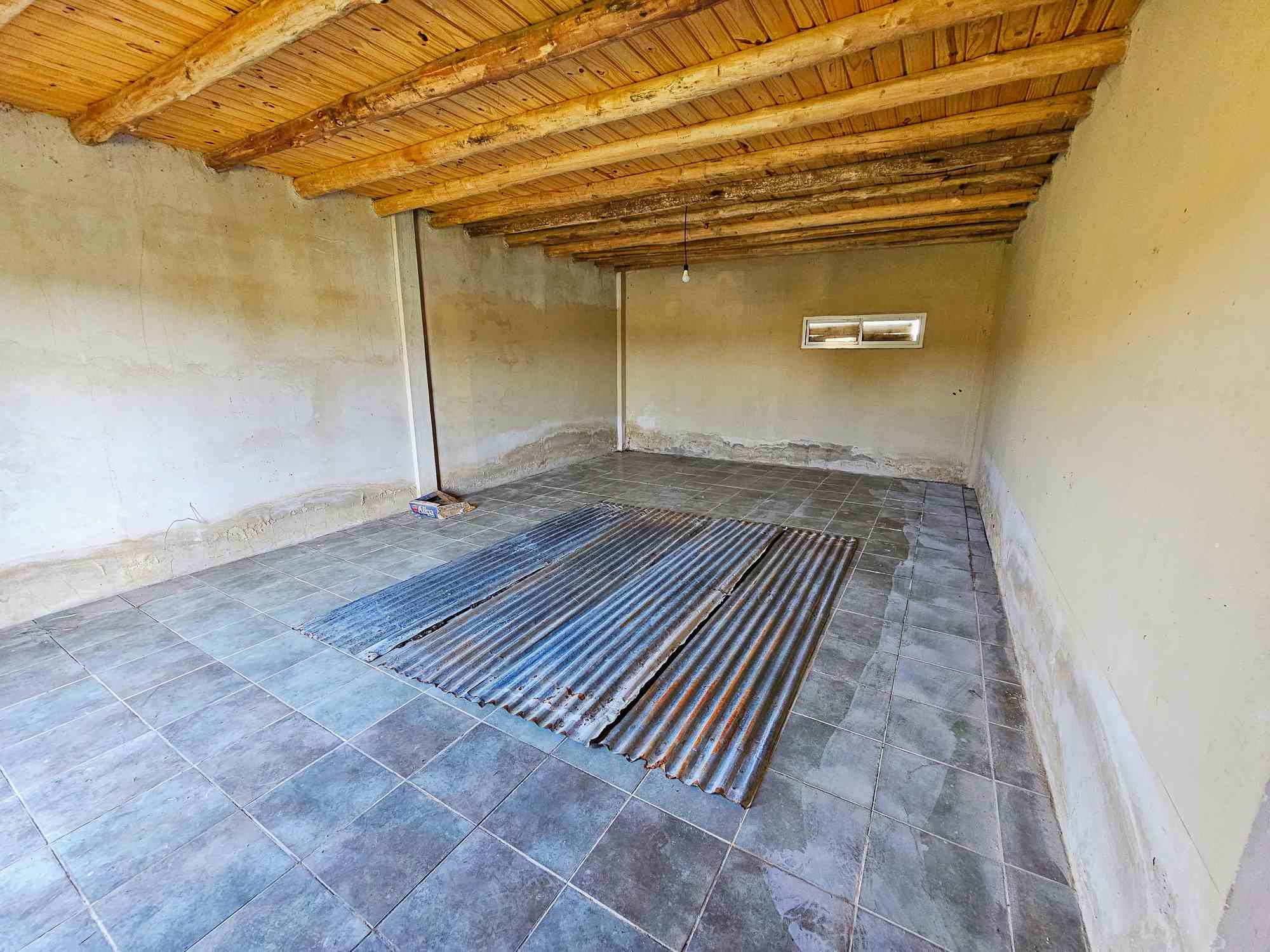 Interior con garage techado de viviendas a estrenar en San José