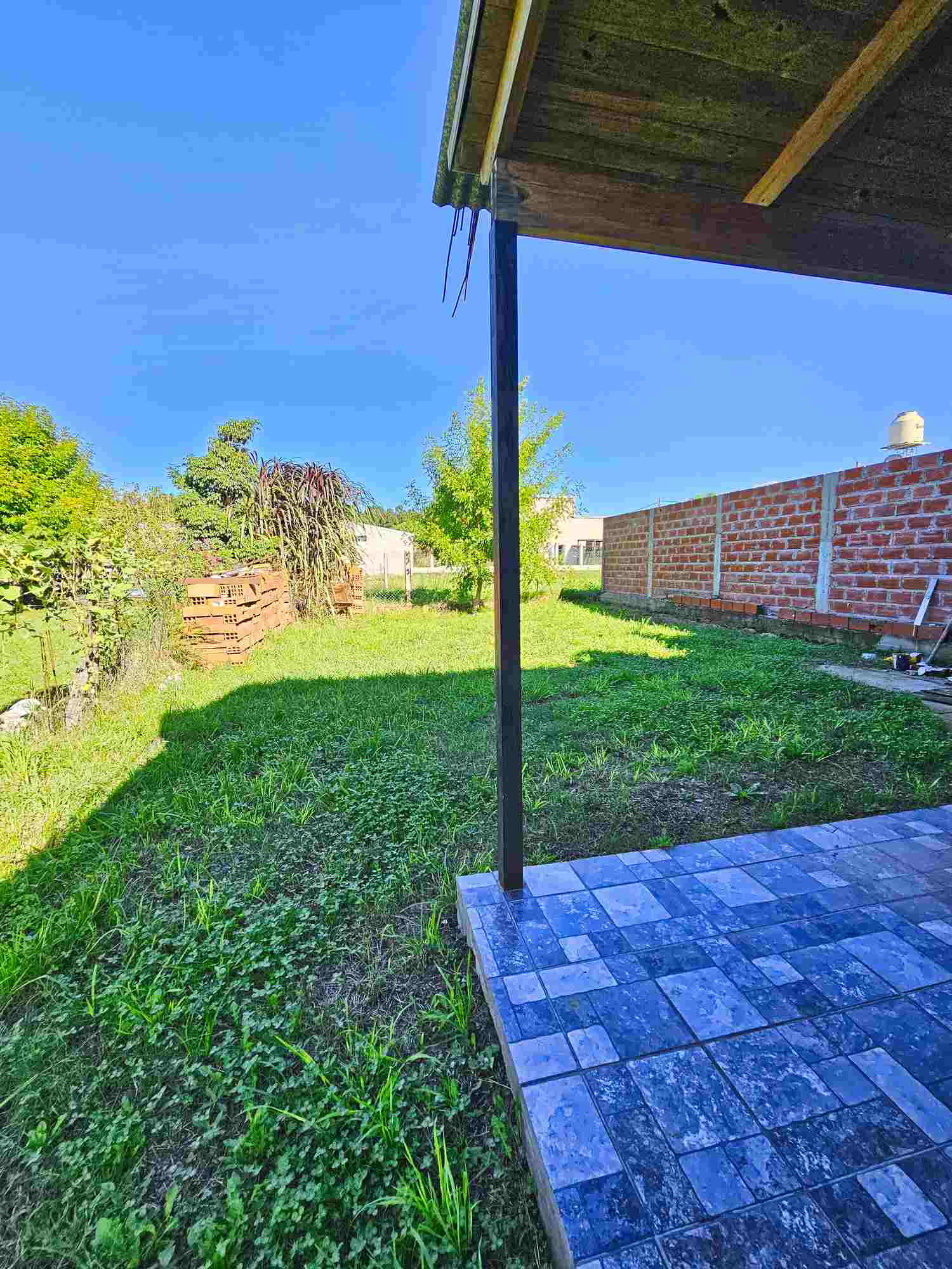 lavadero semicubierto con mesada vivienda San José